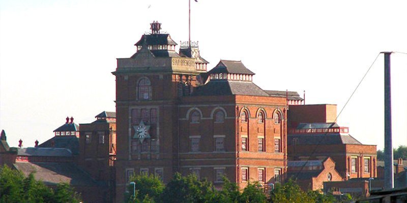 Asmodee Entertainment is based in an amazing building in Nottingham, England. The Star Brewery opened in 1852, producing beer for Shipstones until 1991. Now it contains us (and a range of other businesses). It's a pretty cool home, featuring four-foot thick walls and more metal stairs than you can imagine.