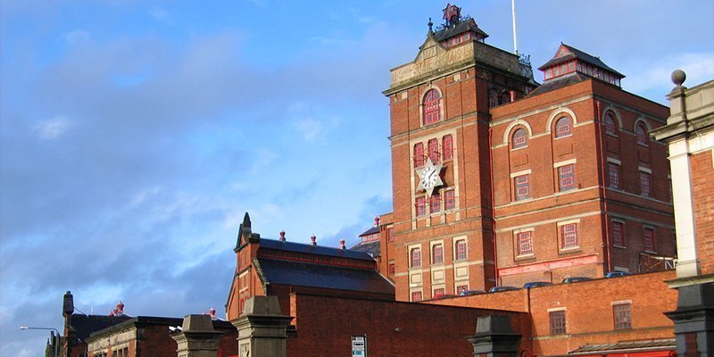 Asmodee Entertainment is based in an amazing building in Nottingham, England. The Star Brewery opened in 1852, producing beer for Shipstones until 1991. Now it contains us (and a range of other businesses). It's a pretty cool home, featuring four-foot thick walls and more metal stairs than you can imagine.